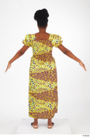  Dina Moses A poses dressed standing whole body yellow long decora apparel african dress 0005.jpg